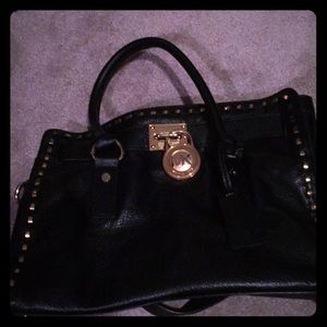 Lightly used Michael Kors black leather bag